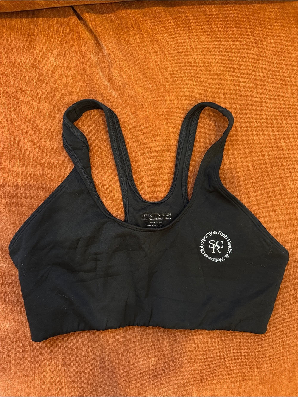 Sporty & Rich Black Racerback Logo Sports Bra